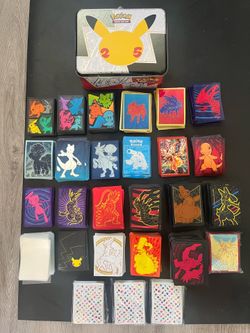 Lot of Pokemon Sleeves + Tin