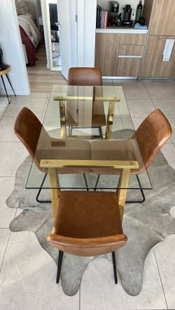 Glass table & butterscotch leather chairs