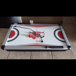 Very small child size electric air hockey table