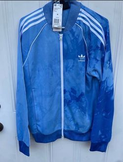 Adidas jacket Pharrell Williams size medium retails 80 dollars