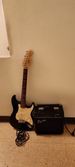 Squirer sonic Stratocaster electric with frontman 10g amp