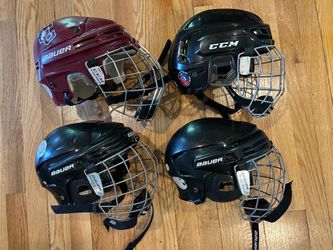 (4) HOCKEY HELMETS