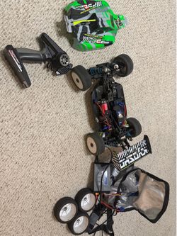 Kyosho MP9e Evo 1/8 Brushless RC Buggy RTR + Charger, Battery & Extras