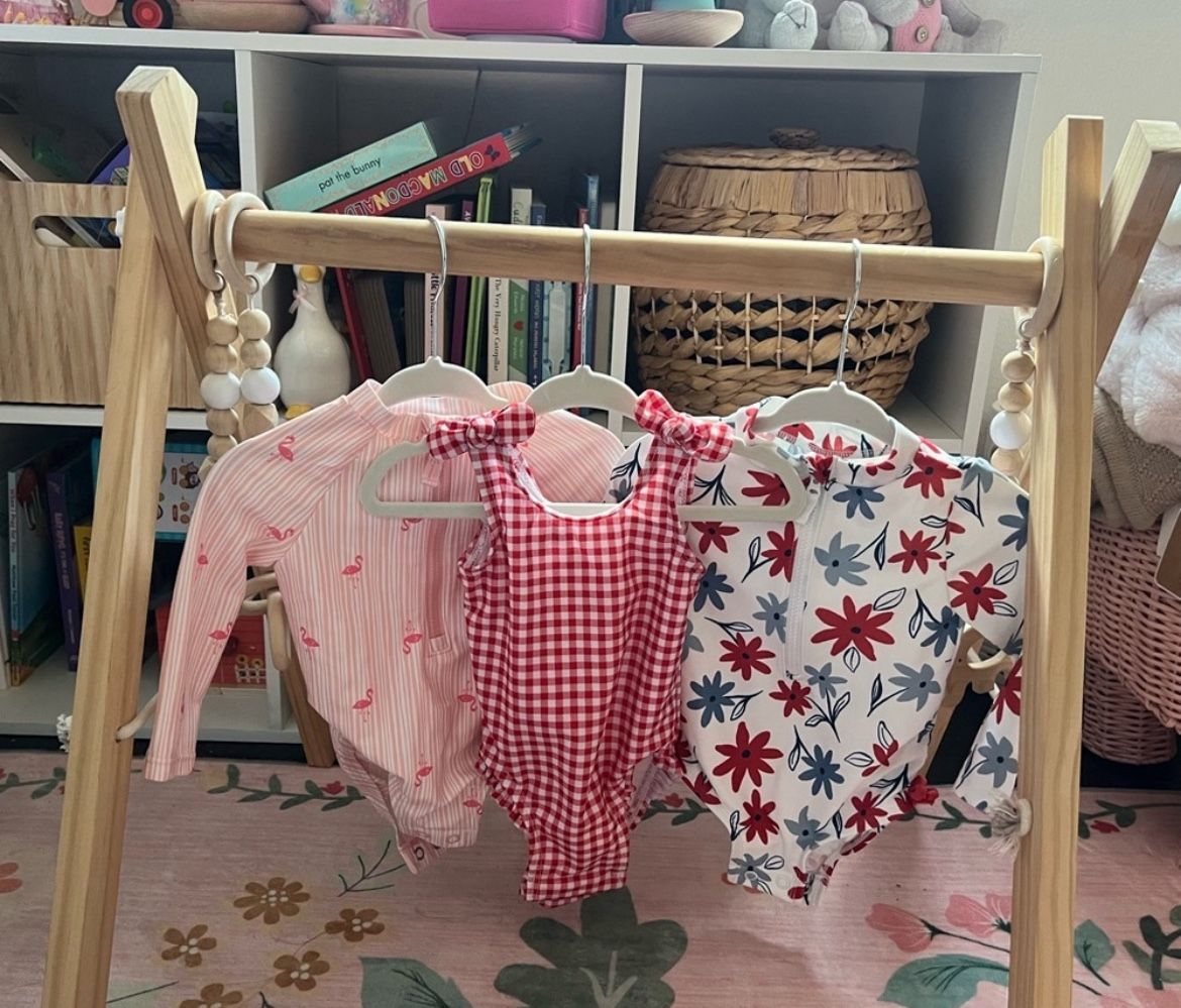 Set of Three Baby Swimsuits in Pink, Red, and White