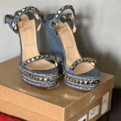 Christian Louboutin- Wedged 