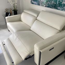 New!!! Atlas From City Furniture, Was $2,300. Power Reclining Loveseat Real Leather, adjustable headrest and footrest. Dimensions 63 W x 33 H x 43.5 L