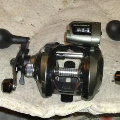 Brand New Okums Convector Baitcast Fishing Real