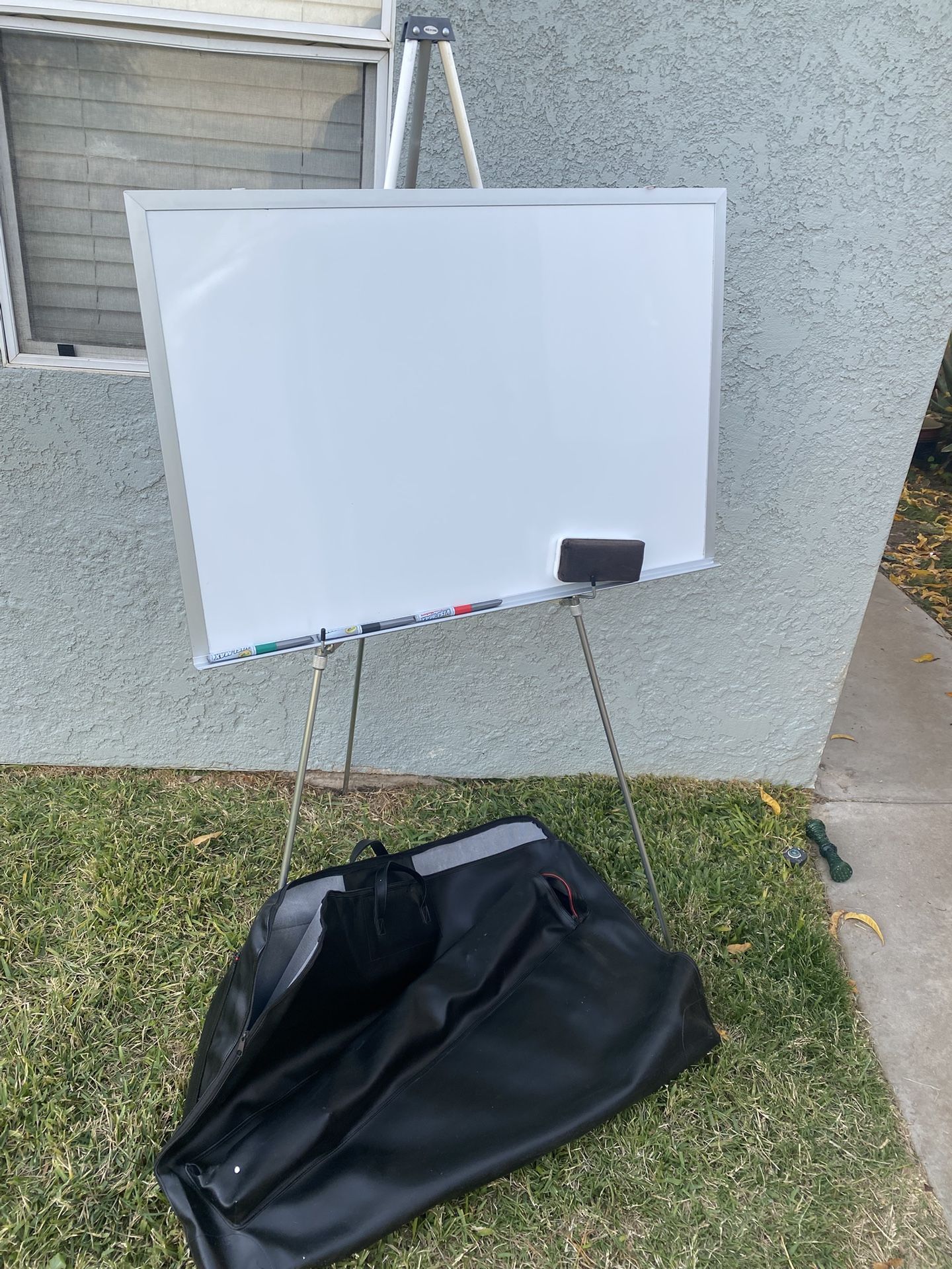 White Board 35 “X 24” With The Tripoide And 64 “ High Eraser Two Markers And The Carry Bag  $30.00