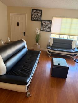 Black leather sofas