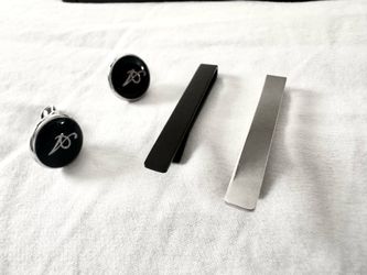 Matte black and polished silver tie bars and Cufflinks