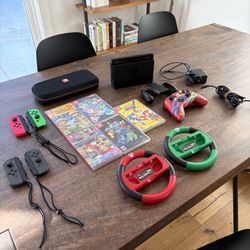 Nintendo Switch with Games Extra Controllers