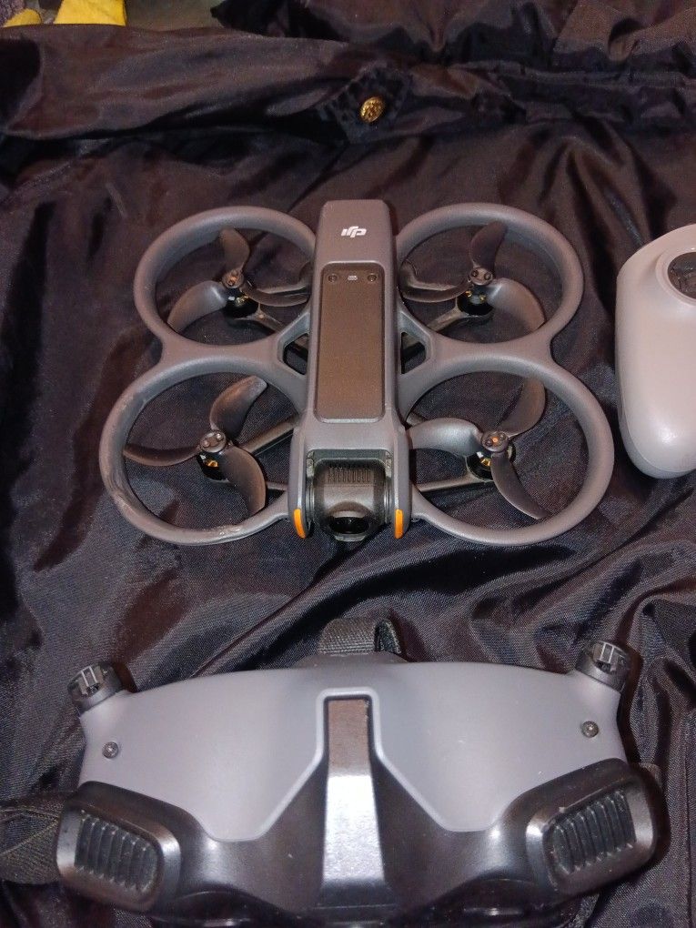 Dji Avata 2 With Goggles, Rc2, Two Battery With Fast Charging Station 