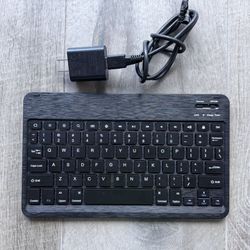 Ultra Thin, Lightweight Portable Bluetooth Keyboard