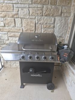 Next grill good condition with full propane tank 120