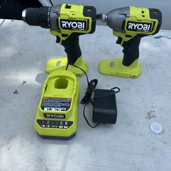 Two Ryobi Tools, Impact , And Drill Driver And Charger