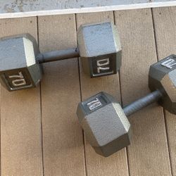 Two 70 pound dumbbell weights 