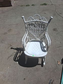White wicker rocking chair