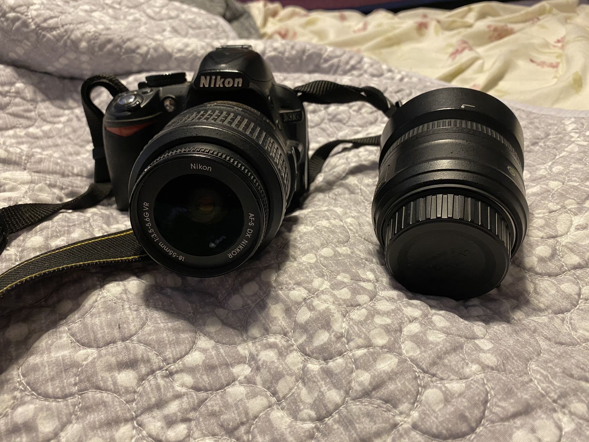 Nikon D3100 with 2 attachable lenses