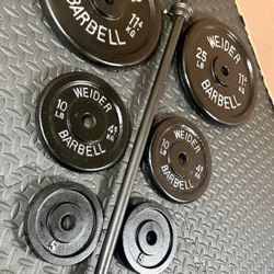 5 ft Standard Barbell with pairs of 25s, 10s and 5 pounders [ All Vintage and reconditioned equipment). Brute Weight= 95#