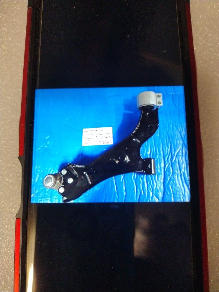 New GM Driver Side Lower Control Arm. OEM Part