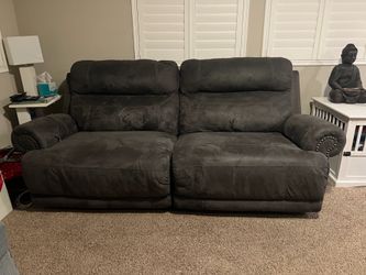 Dark Grey Microfiber Reclining Loveseat with Nailhead Trim