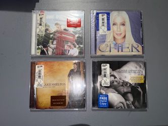 Lot of 4 sealed Music CDs