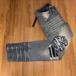 AMIRI Patch Distressed Jeans – Blue Wash (Size 30, Brand New with Tags)