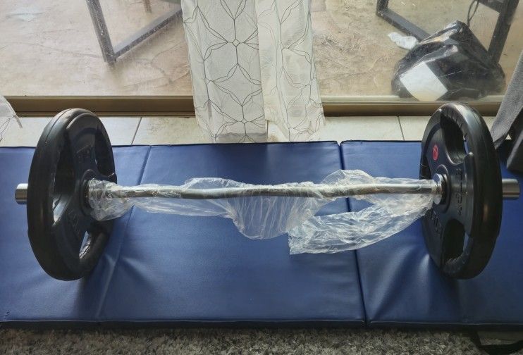 Curl Bar brand New With 90 Pounds = 110 Pound