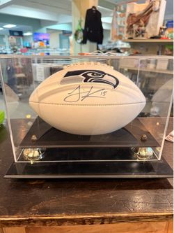 Autographed Seattle Seahawks football signed by Jermaine Kearse with Super Bowl dates inscription, includes Display Case