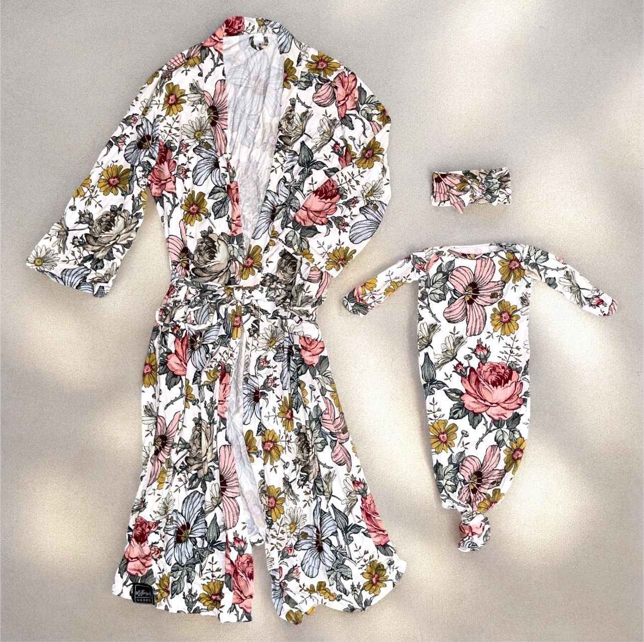 mommy and me”robe and swaddle set, typically used as a hospital outfit for a new mother and her baby