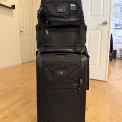 TUMI International Carry-On Roller + TUMI Backpack Set