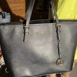 Black leather large Michael Kors purse