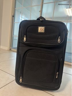 Travelers Choice rolling bag