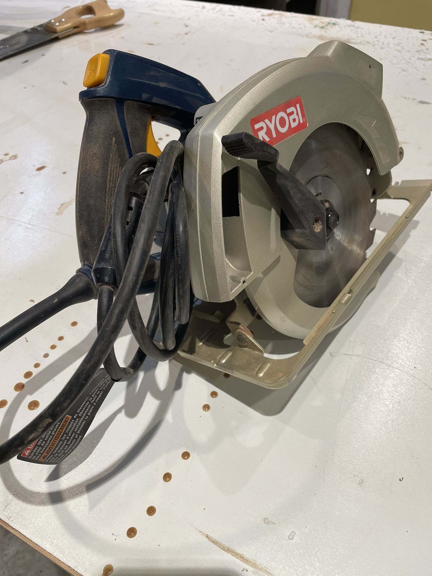 Used but working circular saw with laser