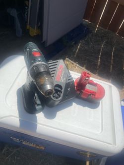 Drill with battery and charger
