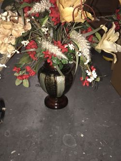 Plastic flowers and vase