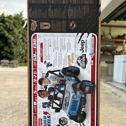 Power Wheels Jeep Wrangler Ride-On Toy Vehicle / Jurassic World 12V 2-seater (130 lb max)