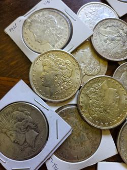 Silver dollars $57.50 Each