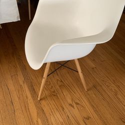 White Molded Chairs With Natural Wood Legs. Set Of 4