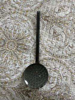 Vintage gray graniteware skimmer spoon