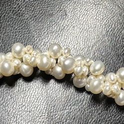 Cluster string of real pearls.