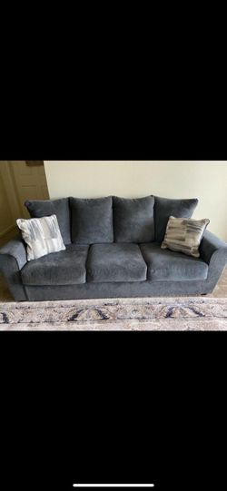 Dark blue sofa and loveseat