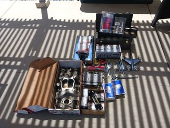 Chevy parts and miscellaneous tools.