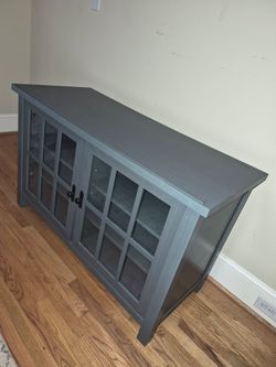 Blue Cabinet with 6 shelves and glass doors