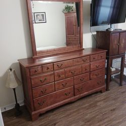 Solid Wood 11 Drawer Dresser With Large Mirror.