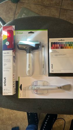 Cricut heat transfer vinyl, pens, applicator and remover set, and scraper and spatula