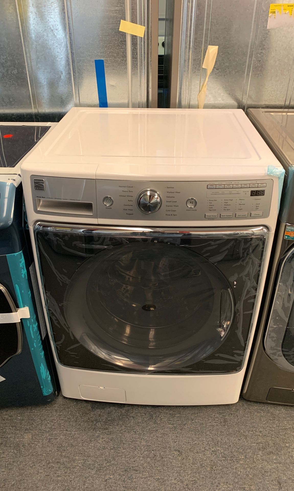 New scratch and dent Kenmore elite 5.2 cu.ft front load washer 1 year warranty