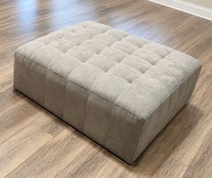 Large gray tufted ottoman