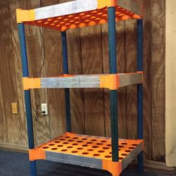 Orange and blue plastic shelf.
