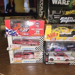 Lot of 8 1/64  scale diecast cars...Hotwheels...Nascar...Fast and the Furious